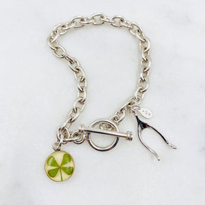 Good Luck Sterling Silver Charm Bracelet  with real four leaf clover and wishbone