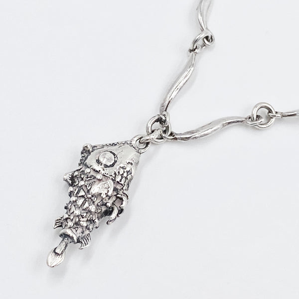 swimming fish silver necklace